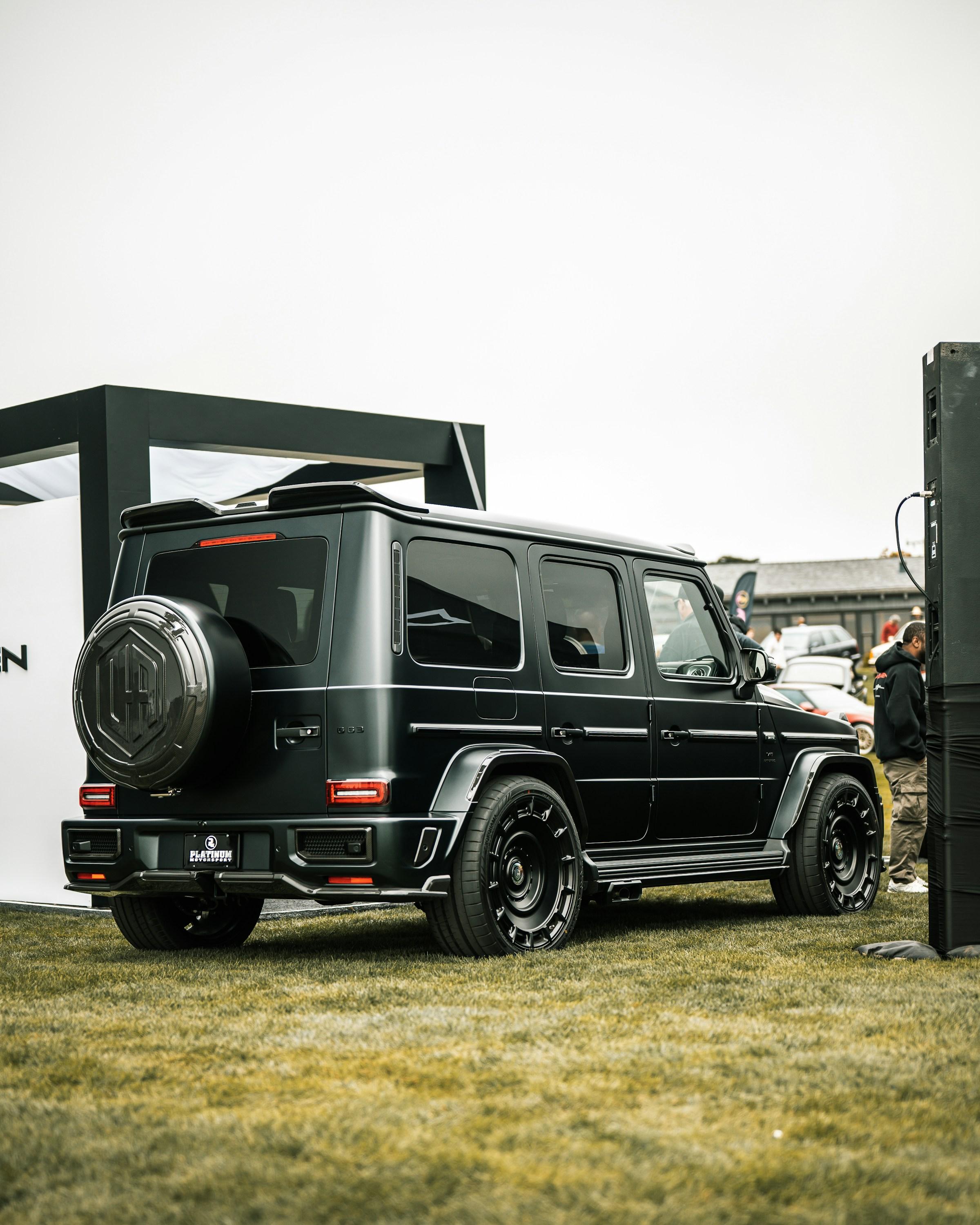 Black Mercedes-Benz G-Class photographed at an automotive event